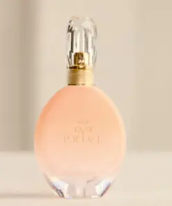 avon eve prive [perfume bottle on a cream background